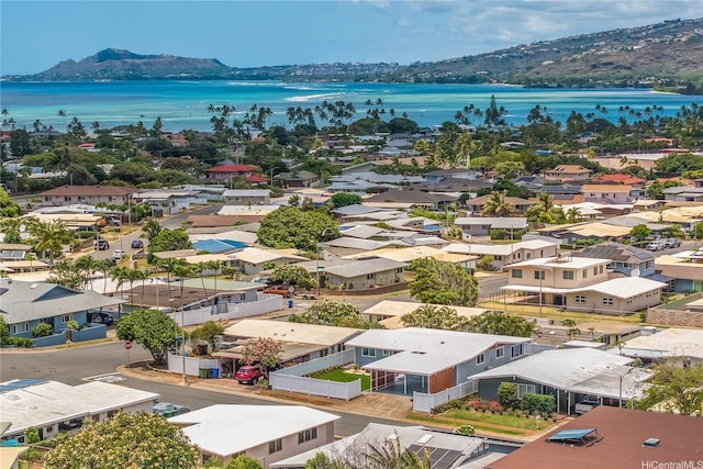 bird's eye view featuring a residential view and a water and mountain view