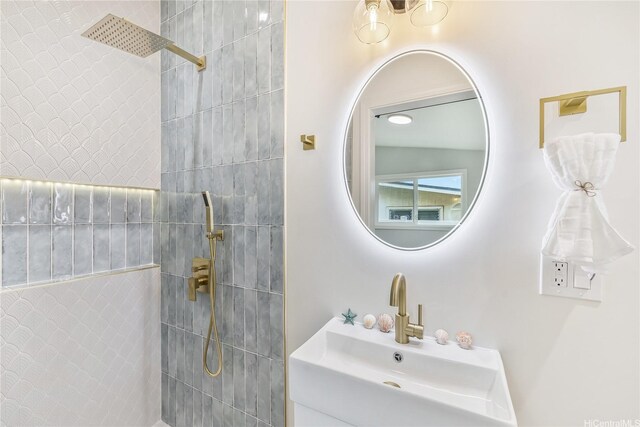 bathroom with a sink and a walk in shower