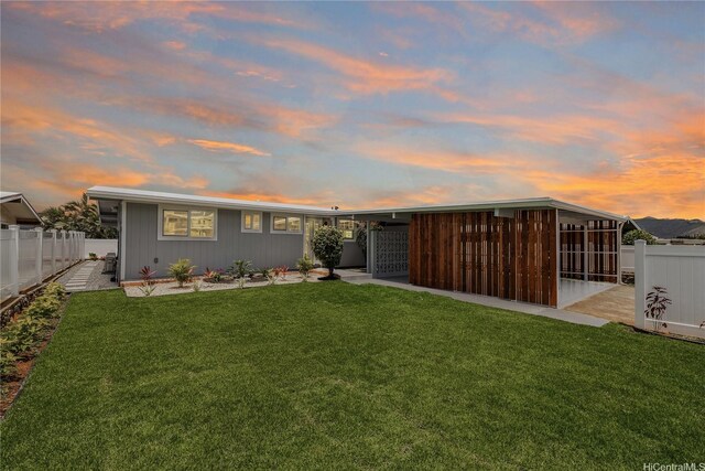 308 Hanakoa St, Honolulu, HI 96825 - back of house at dusk with a sunroom