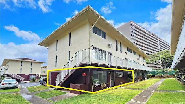 view of property featuring stairs