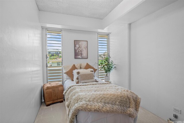 3350 Sierra Dr Unit 601, Honolulu, HI 96816 - carpeted bedroom with a textured ceiling