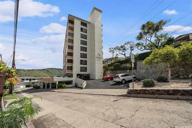 3350 Sierra Dr Unit 601, Honolulu, HI 96816 - view of building exterior with uncovered parking