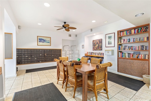 tiled dining space with mail area, a ceiling fan, baseboards, and recessed lighting