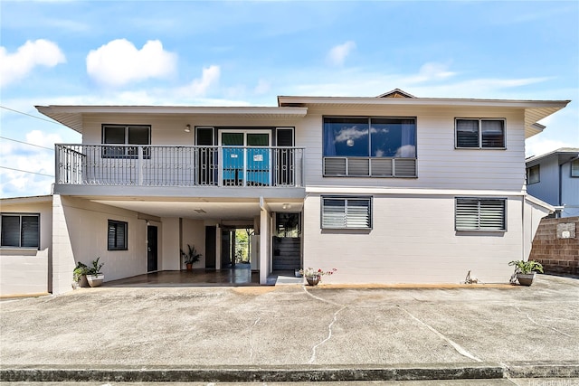 1727 Ema Pl, Honolulu, HI 96819 - view of front of home featuring concrete driveway and a carport