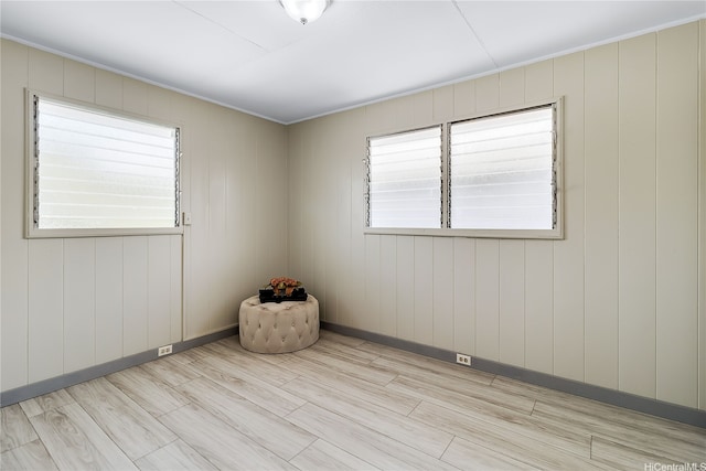 1727 Ema Pl, Honolulu, HI 96819 - spare room featuring baseboards, wood finished floors, and a healthy amount of sunlight