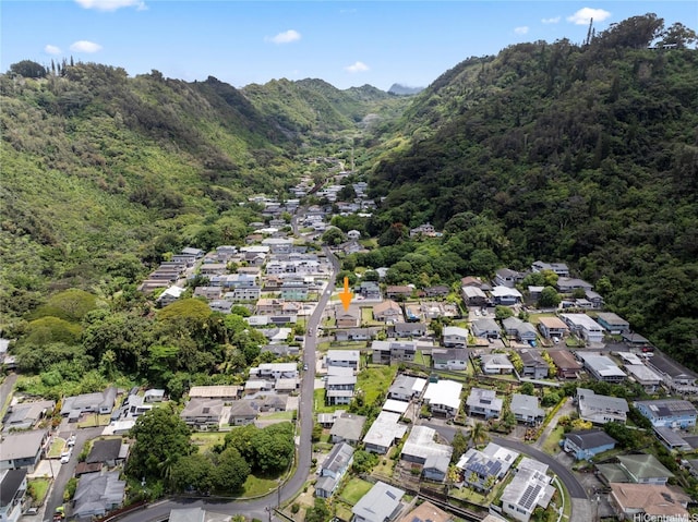 aerial view featuring a residential view, a mountain view, and a wooded view