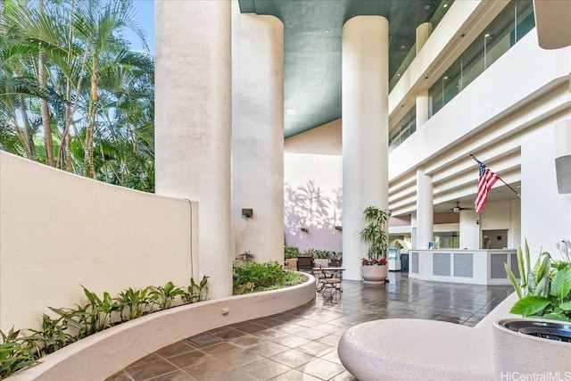 1212 Nuuanu Ave Unit 1306, Honolulu, HI 96817 - view of patio with an outdoor kitchen and ceiling fan