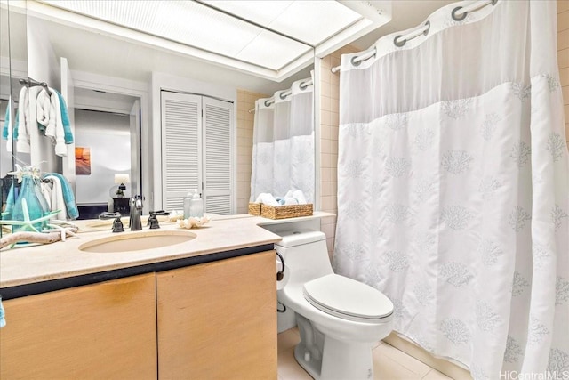 1212 Nuuanu Ave Unit 1306, Honolulu, HI 96817 - bathroom featuring vanity, toilet, tile patterned flooring, and a shower with curtain