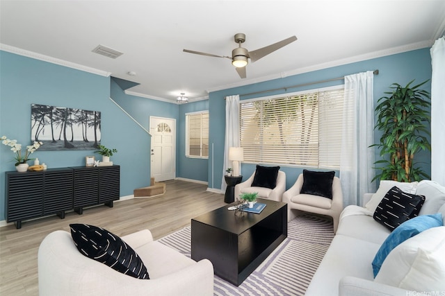 91-1034 Kamailio St Unit 106, Ewa Beach, HI 96706 - living room with wood finished floors, ceiling fan, and crown molding