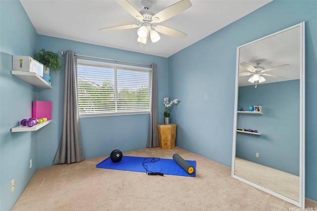 playroom featuring a ceiling fan and carpet