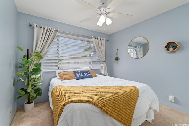 bedroom featuring carpet flooring and a ceiling fan