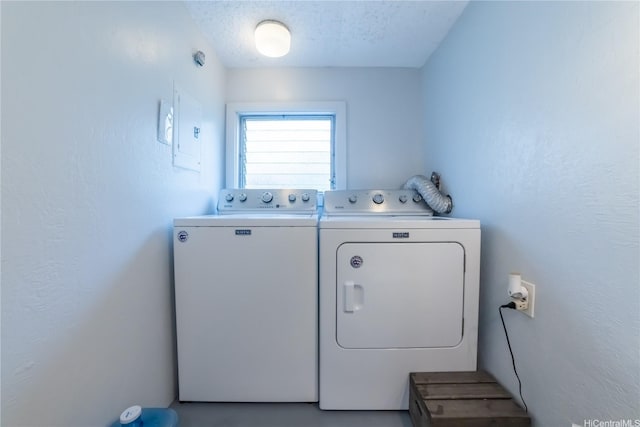 laundry room featuring washer and dryer and laundry area