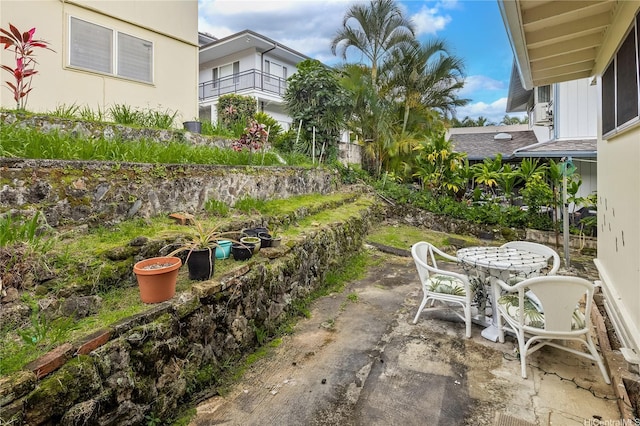 view of patio featuring outdoor dining area