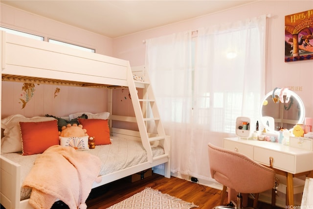 bedroom featuring wood finished floors