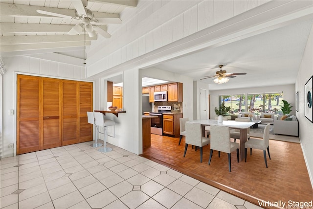 98-1724 Kaahumanu St Unit 16C, Pearl City, HI 96782 - dining room with a ceiling fan and vaulted ceiling with beams