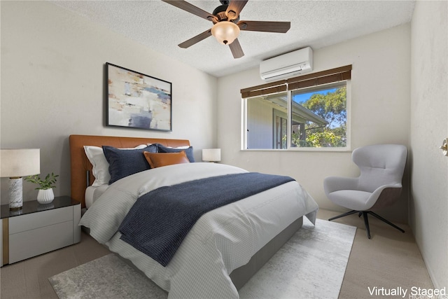 98-1724 Kaahumanu St Unit 16C, Pearl City, HI 96782 - carpeted bedroom featuring ceiling fan, a textured ceiling, and an AC wall unit