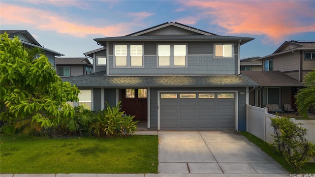 91-1015 Akai St, Ewa Beach, HI 96706 - view of front of home with an attached garage, concrete driveway, and a shingled roof