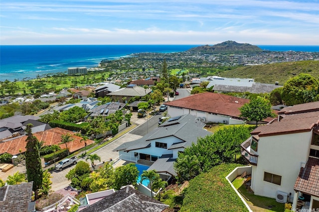 birds eye view of property featuring a residential view and a water view