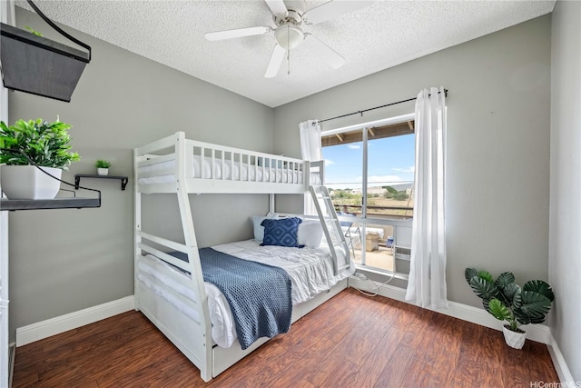 91-568 Puamaeole St Unit 50T, Ewa Beach, HI 96706 - bedroom with wood finished floors, baseboards, a textured ceiling, and ceiling fan