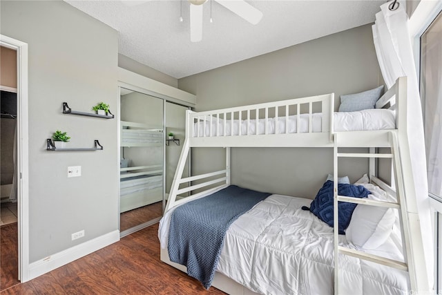 91-568 Puamaeole St Unit 50T, Ewa Beach, HI 96706 - bedroom with wood finished floors, baseboards, a closet, and a ceiling fan