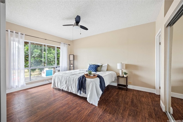 91-568 Puamaeole St Unit 50T, Ewa Beach, HI 96706 - bedroom with wood finished floors, a textured ceiling, baseboards, and ceiling fan
