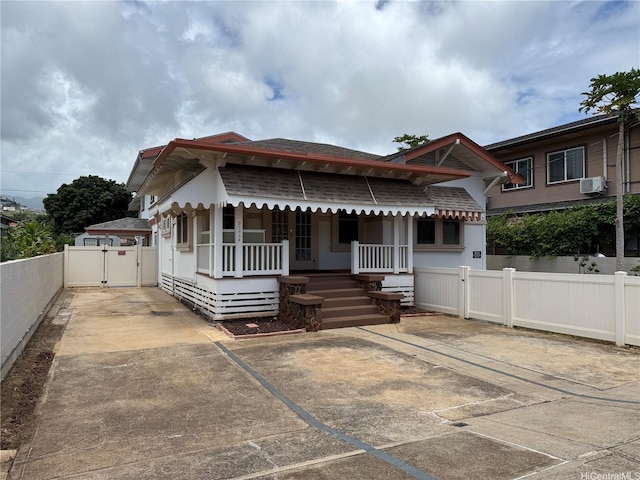3142 Olu St, Honolulu, HI 96816 - bungalow featuring covered porch, driveway, a gate, fence, and cooling unit
