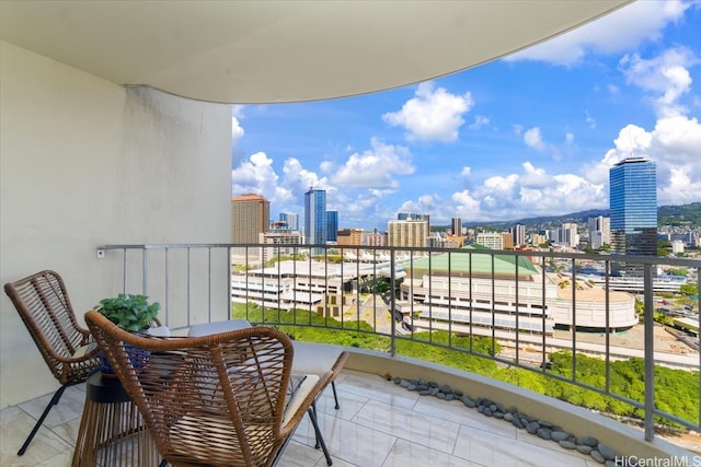 balcony featuring a view of city