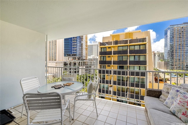 balcony featuring a city view