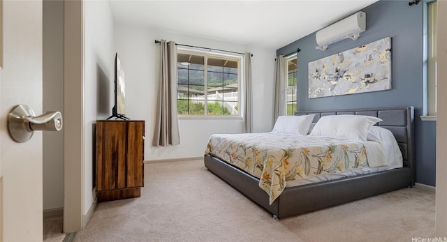 84-928 Maiola St Unit 76, Waianae, HI 96792 - carpeted bedroom featuring a wall mounted air conditioner and baseboards