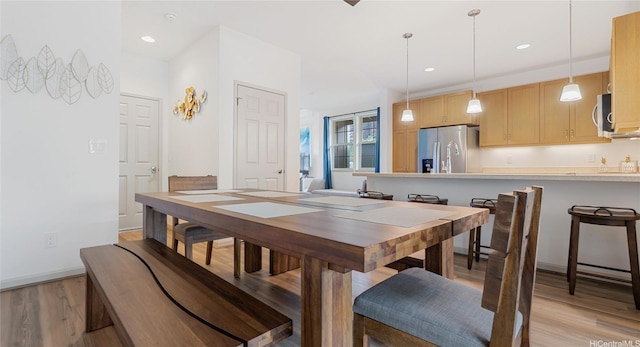84-928 Maiola St Unit 76, Waianae, HI 96792 - dining room with light wood finished floors, recessed lighting, and baseboards