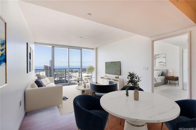 dining room featuring floor to ceiling windows