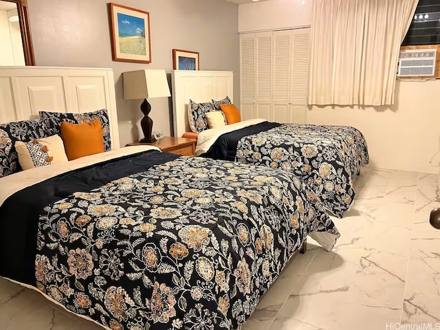 2240 Kuhio Ave Unit 2305, Honolulu, HI 96815 - bedroom with marble finish floor, cooling unit, and a closet