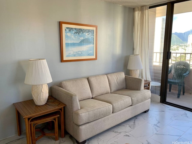 2240 Kuhio Ave Unit 2305, Honolulu, HI 96815 - living room featuring marble finish floor and a mountain view