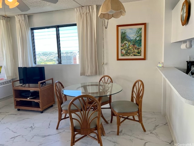 2240 Kuhio Ave Unit 2305, Honolulu, HI 96815 - dining room featuring marble finish floor and ceiling fan