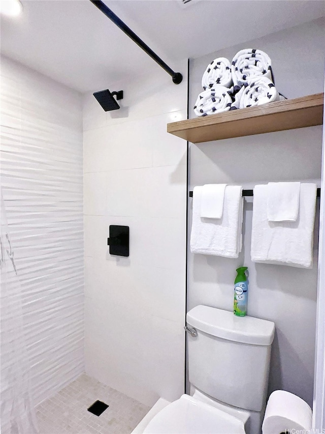 201 Ohua Ave Unit 610, Honolulu, HI 96815 - full bathroom featuring toilet and tiled shower