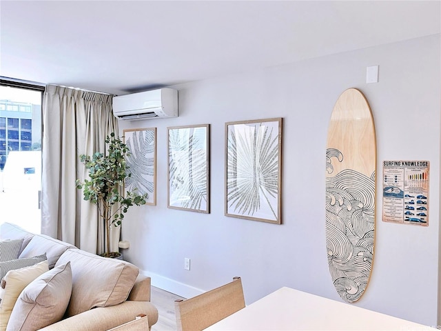201 Ohua Ave Unit 610, Honolulu, HI 96815 - interior space with baseboards and an AC wall unit