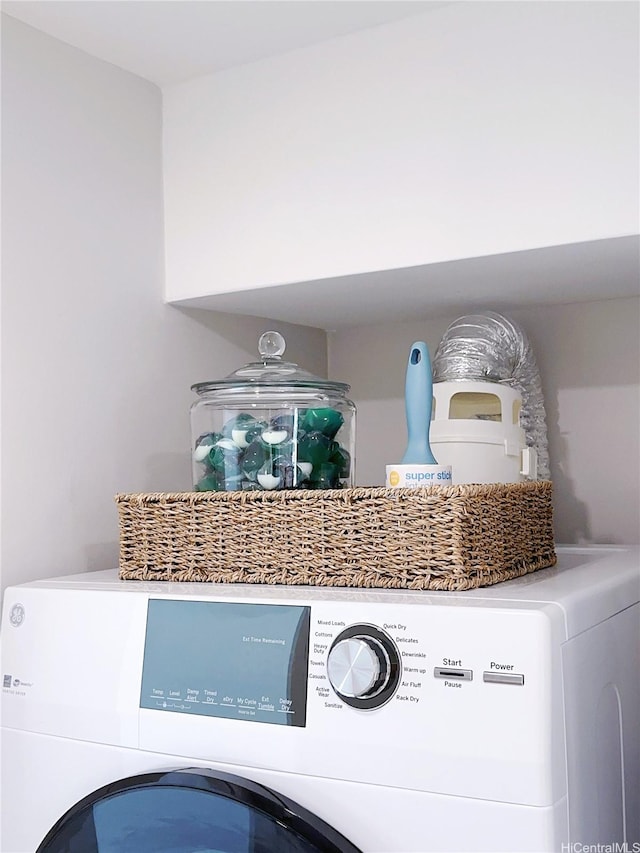 201 Ohua Ave Unit 610, Honolulu, HI 96815 - clothes washing area with washer / dryer and laundry area