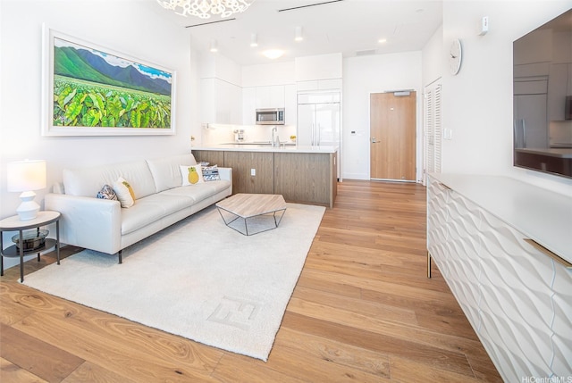 living area with light wood-type flooring