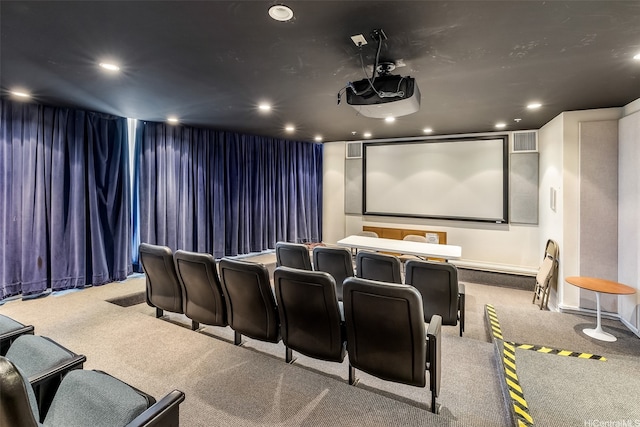 cinema room featuring recessed lighting, visible vents, and carpet