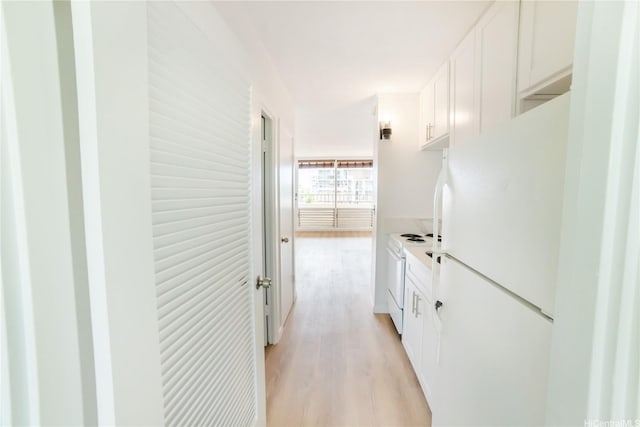 hall featuring light wood-style floors