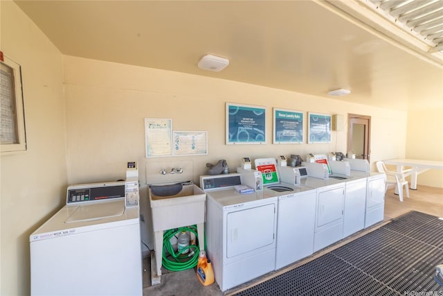 shared laundry area with separate washer and dryer