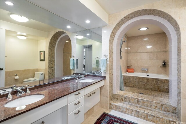 425 S St Unit 1401, Honolulu, HI 96813 - full bath with toilet, tile patterned flooring, double vanity, tiled shower, and a relaxing tiled tub