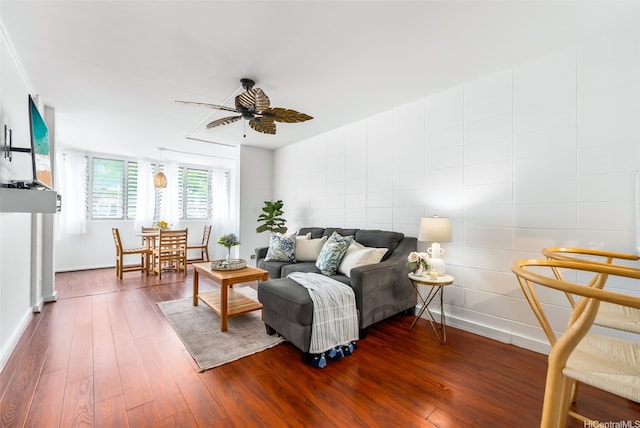 3131 Pualei Cir Unit 15, Honolulu, HI 96815 - living room featuring ceiling fan, baseboards, and dark wood-style flooring