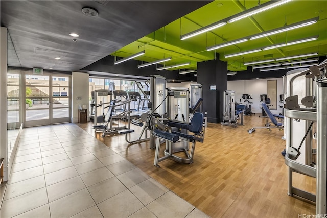 workout area featuring wood finished floors