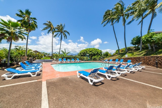 pool with a patio area