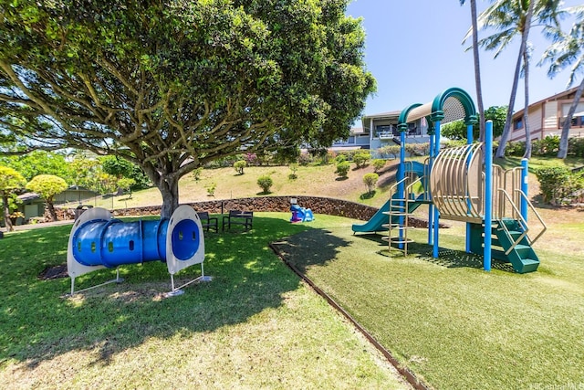 community play area with a lawn