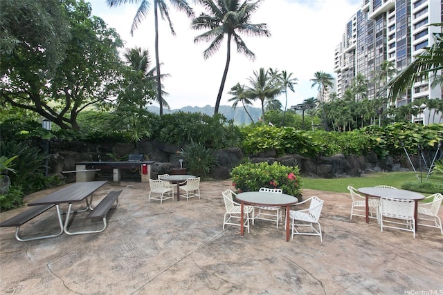 521 Hahaione St Unit 2-6J, Honolulu, HI 96825 - view of patio / terrace featuring outdoor dining area