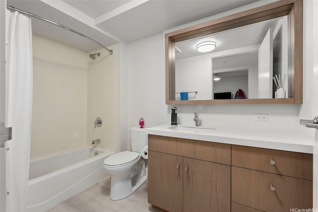 full bathroom featuring toilet, vanity, and shower / tub combo with curtain