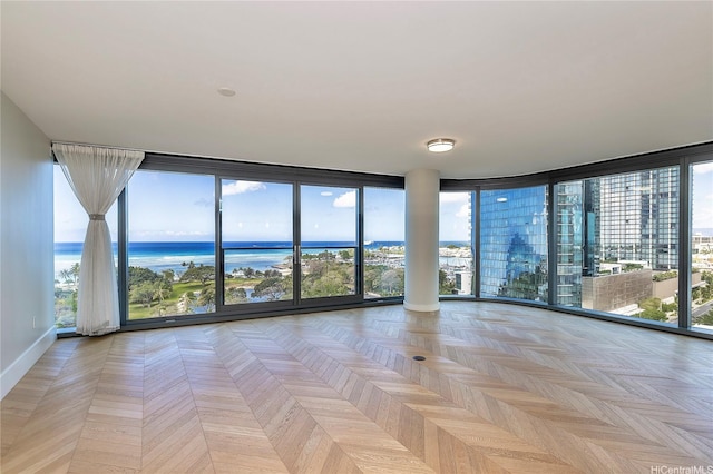 1108 Auahi St Unit 1001, Honolulu, HI 96814 - empty room with a water view and a wall of windows