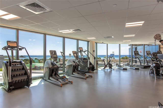 1108 Auahi St Unit 1001, Honolulu, HI 96814 - workout area featuring a water view, floor to ceiling windows, a drop ceiling, and visible vents